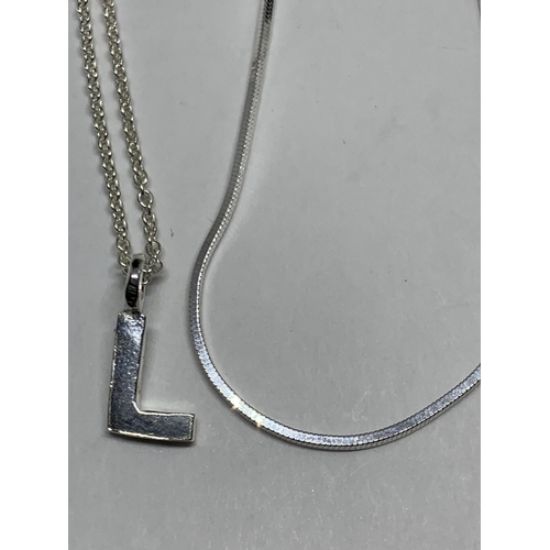 673 - FOUR MARKED SILVER NECKLACES TO INCLUDE M, E AND L INITIALS