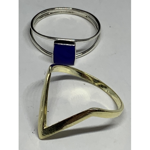 676 - FOUR MARKED SILVER RINGS TO INCLUDE A K INITIAL AND A GOLD PLATED WISHBONE