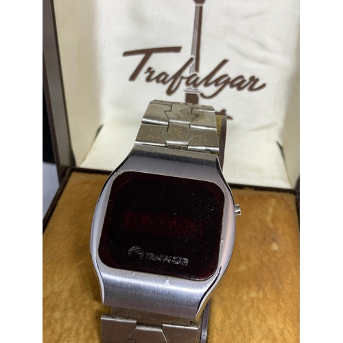 687 - A VINTAGE TRAFALGAR FIVE FUNCTION DIGITAL WATCH WITH STAINLESS STEEL CASE AND STRAP, ORIGINAL INSTRU... 