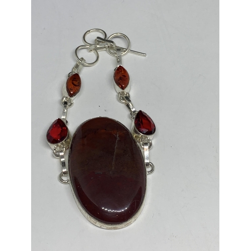 693 - A MARKED SILVER BRACELET WITH JASPER STONES IN A PRESENTATION BOX