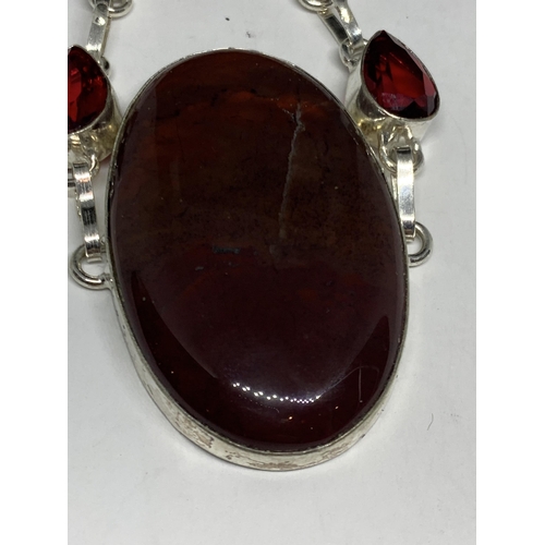 693 - A MARKED SILVER BRACELET WITH JASPER STONES IN A PRESENTATION BOX