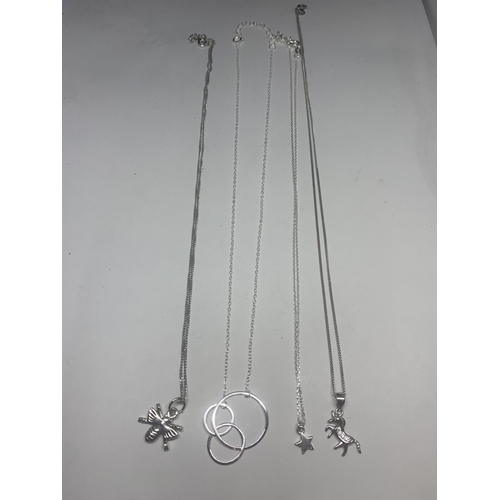 735 - FOUR MARKED SILVER NECKLACES WITH PENDANTS