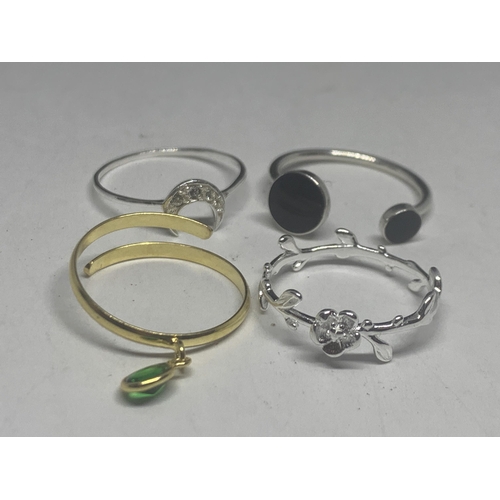 737 - FOUR MARKED SILVER RINGS TO INCLUDE A GOLD PLATED