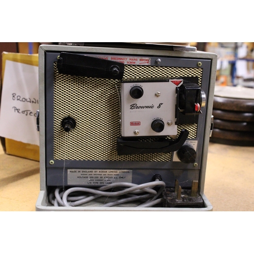 946 - A KODAK BROWNIE 8 MOVIE PROJECTOR A-15G IN ORIGINAL BOX PLUS A TRIPOD