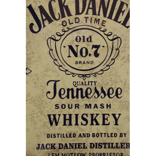 978 - A FRAMED TIN PLATE JACK DANIELS SIGN