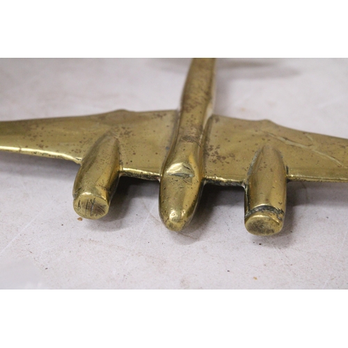 989 - A 1930'S BRASS MODEL OF A BOMBER PLANE