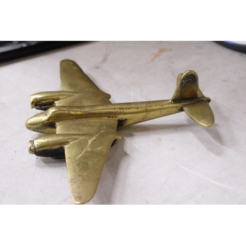 989 - A 1930'S BRASS MODEL OF A BOMBER PLANE