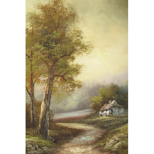 1074 - A FRAMED OIL ON BOARD OF A COUNTRY SCENE