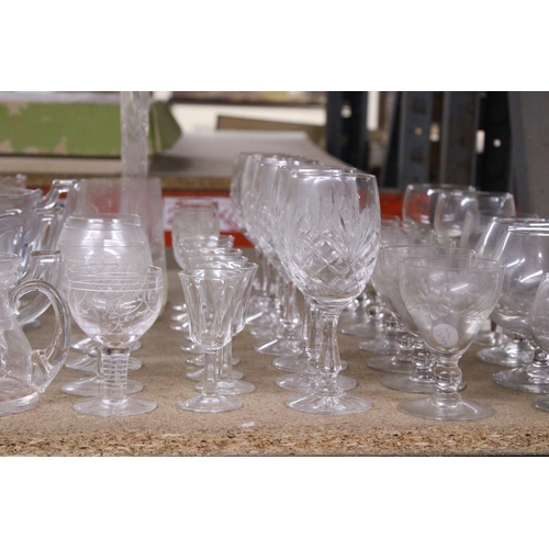 1080 - A LARGE QUANTITY OF GLASSWARE TO INCLUDE BOWLS, WINE GLASSES, SHERRY, BRANDY, ETC