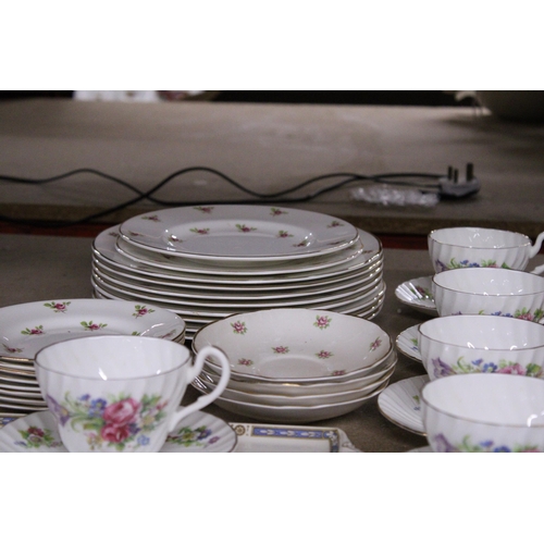 1111 - A COLLECTION OF TEAWARE TO INCLUDE CUPS, SAUCERS, PLATES, ETC