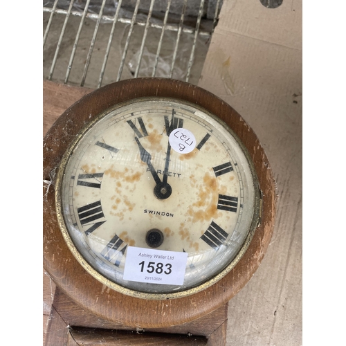 1583 - A SMALL OAK CASED PARRETT SWINDON WALL CLOCK