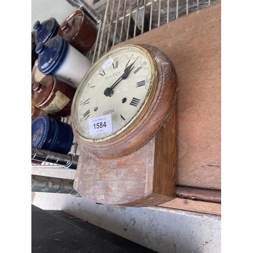 1584 - A SMALL OAK CASED G.A.FOX SARN WALL CLOCK