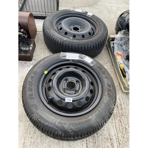 1700 - TWO FOUR STUD SPARE WHEELS ONE TO FIT A RENULT MEGAN AND ONE TO FIT A DAEWOO NABIRA