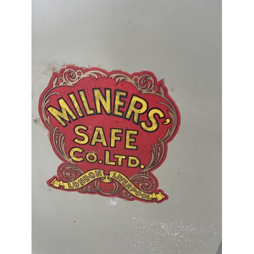 1740 - A HEAVY DUTY MILNERS SAFE COMPLETE WITH KEY