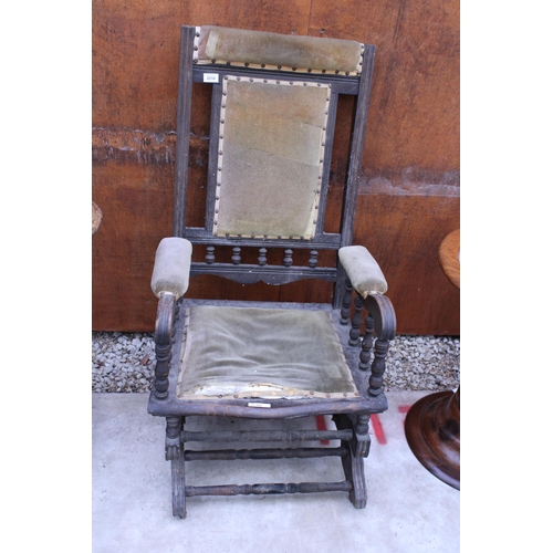 2988 - A LATE VICTORIAN AMERICAN STYLE ROCKING CHAIR