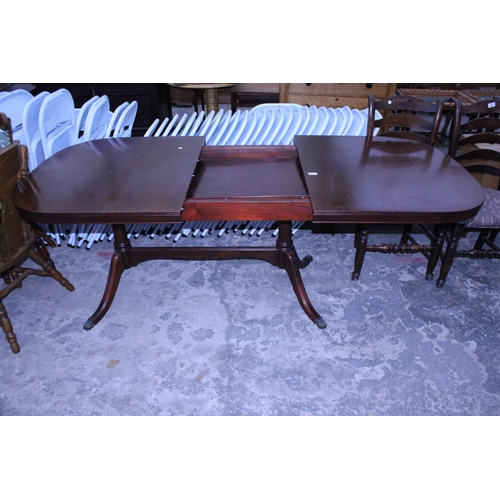 3000 - A MAHOGANY AND CROSSBANDED TWIN PEDESTAL DINING TABLE, 63