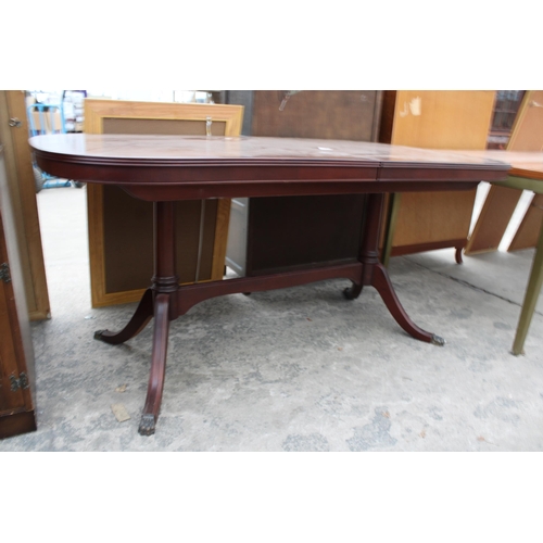 3000 - A MAHOGANY AND CROSSBANDED TWIN PEDESTAL DINING TABLE, 63