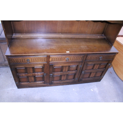 3001 - A REPRODUCTION DRESSER WITH GLAZED AND LEADED UPPER PORTION, 59