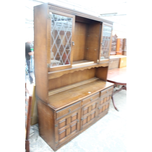 3001 - A REPRODUCTION DRESSER WITH GLAZED AND LEADED UPPER PORTION, 59