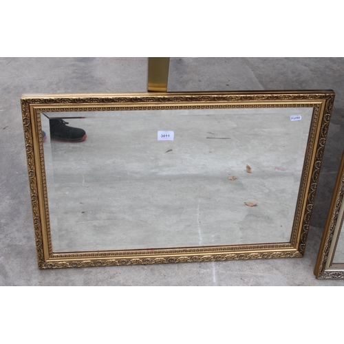 3011 - A GILT EFFECT BEVEL EDGE WALL MIRROR, 29