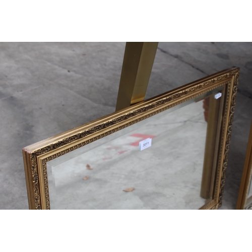 3011 - A GILT EFFECT BEVEL EDGE WALL MIRROR, 29