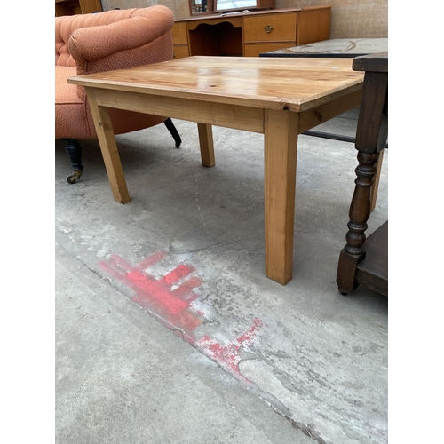 3067 - AN OAK LAMP TABLE AND A PINE COFFEE TABLE