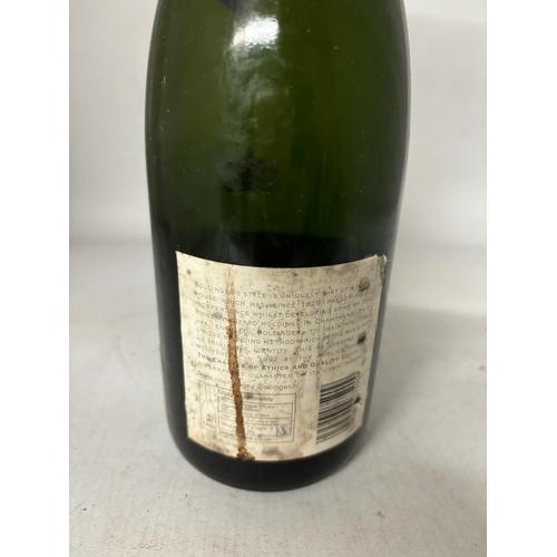 438 - A BOTTLE OF BOLLINGER CHAMPAGNE