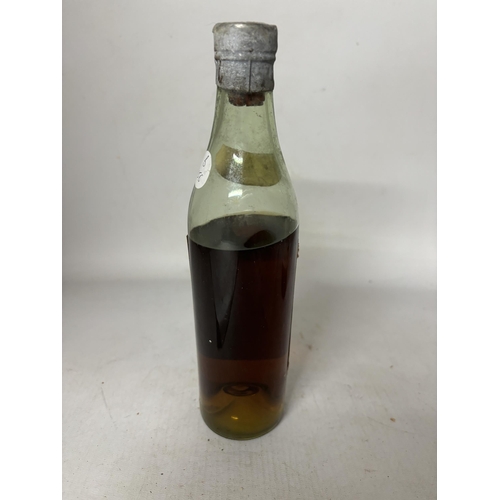 446 - A SMALL BOTTLE OF BARNETT AND FILS COGNAC MAXIMUM PRICE 21/6 PER BOTTLE (LEVEL BELOW SHOULDER)