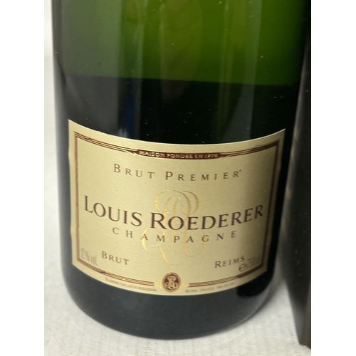 338 - A BOXED BOTTLE OF LOUIS ROEDERER CHAMPAGNE