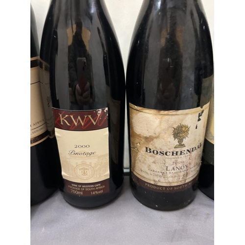 348 - SIX BOTTLES OF RED WINE TO INCLUDE KMV ROODEBERG WINE OF WESTERN CAPE 2003, OAK VILLAGE VINTAGE RESE... 