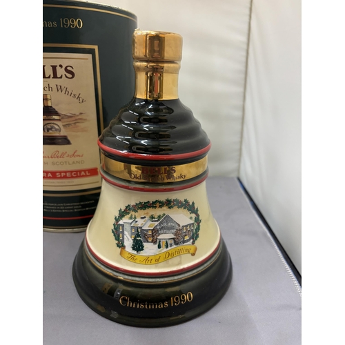 351 - A BOXED AND SEALED BELL'S OLD SCOTCH WHISKY EXTRA SPECIAL CHRISTMAS 1990 IN A WADE PORCELAIN CHRISTM... 