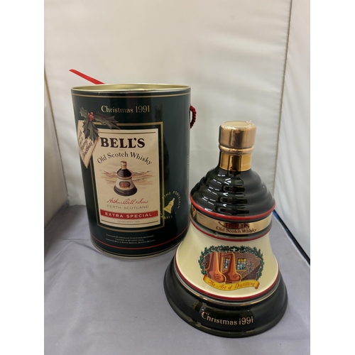 352 - A BOXED AND SEALED BELL'S OLD SCOTCH WHISKY EXTRA SPECIAL CHRISTMAS 1991 IN A WADE PORCELAIN CHRISTM... 