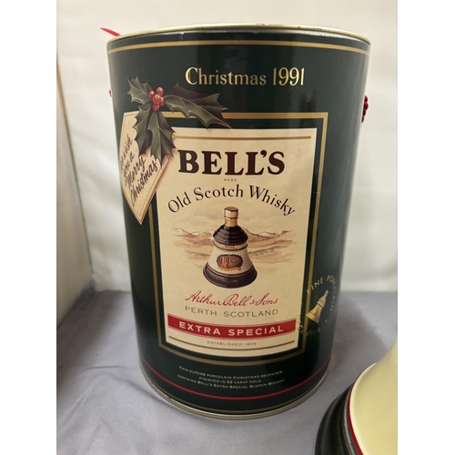 352 - A BOXED AND SEALED BELL'S OLD SCOTCH WHISKY EXTRA SPECIAL CHRISTMAS 1991 IN A WADE PORCELAIN CHRISTM... 