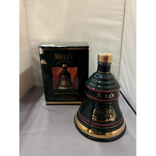 353 - A BOXED AND SEALED BELL'S FINEST OLD SCOTCH WHISKY CHRISTMAS 1992 IN A WADE PORCELAIN CHRISTMAS DECA... 