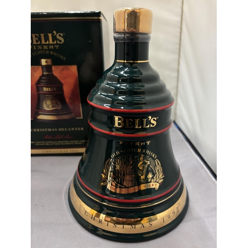 353 - A BOXED AND SEALED BELL'S FINEST OLD SCOTCH WHISKY CHRISTMAS 1992 IN A WADE PORCELAIN CHRISTMAS DECA... 