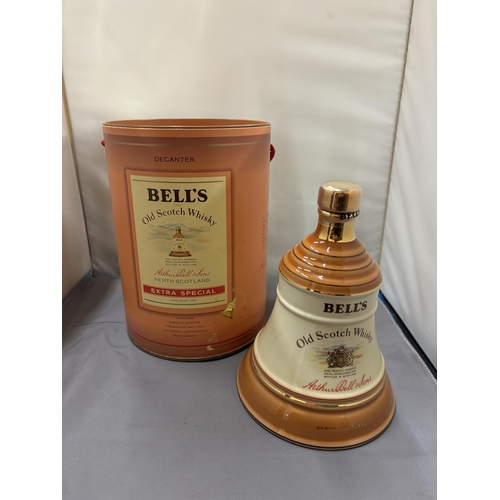 354 - A BOXED AND SEALED BELL'S EXTRA SPECIAL OLD SCOTCH WHISKY IN A WADE PORCELAIN DECANTER FINISHED IN 2... 