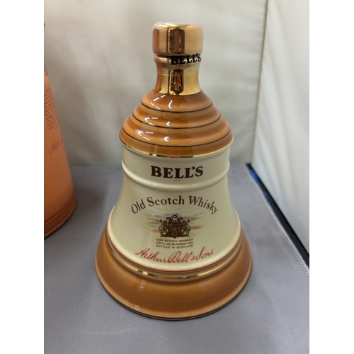 354 - A BOXED AND SEALED BELL'S EXTRA SPECIAL OLD SCOTCH WHISKY IN A WADE PORCELAIN DECANTER FINISHED IN 2... 