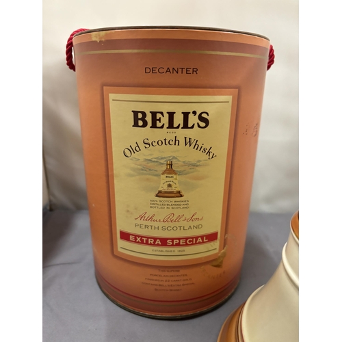 355 - A BOXED AND SEALED BELL'S EXTRA SPECIAL OLD SCOTCH WHISKY IN A WADE PORCELAIN DECANTER FINISHED IN 2... 