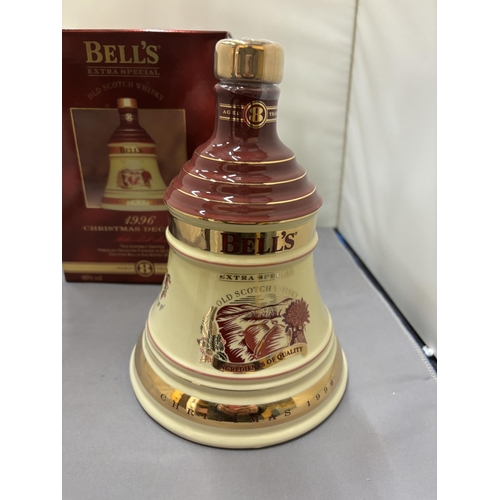 360 - A BOXED AND SEALED BELL'S EXTRA SPECIAL OLD SCOTCH WHISKY CHRISTMAS 1996 IN A PORCELAIN DECANTER FIN... 