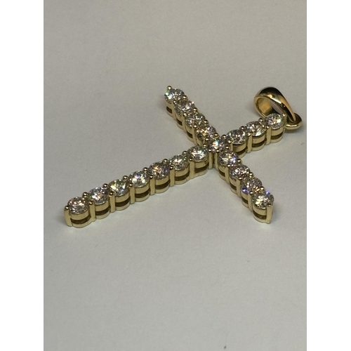 615 - AN 18 CARAT YELLOW GOLD CROSS PENDANT WITH 2.5 CARATS OF ROUND BRILLIANT CUT DIAMONDS GROSS WEIGHT 4... 