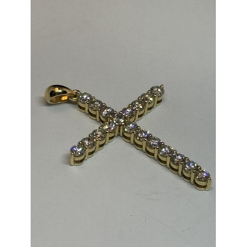 615 - AN 18 CARAT YELLOW GOLD CROSS PENDANT WITH 2.5 CARATS OF ROUND BRILLIANT CUT DIAMONDS GROSS WEIGHT 4... 