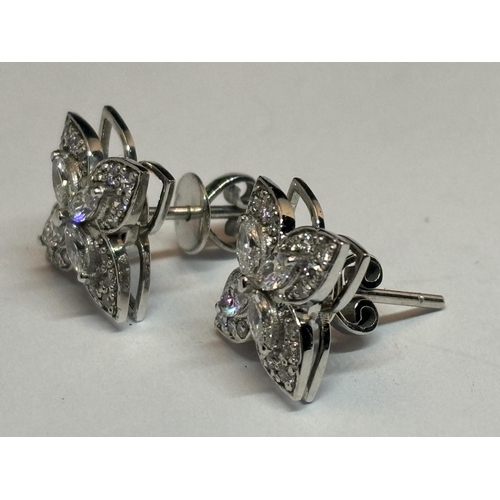 617 - A PAIR OF 18 CARAT WHITE GOLD EARRINGS WITH 0.85 CARATS OF MARQUISE AND ROUND BRILLIANT CUT NATURAL ... 