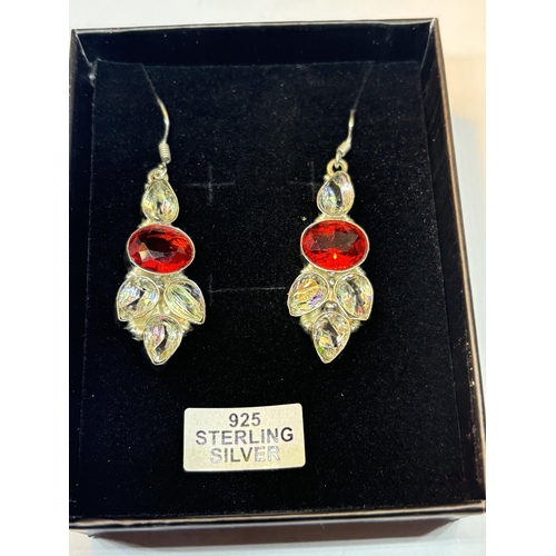 620 - A PAIR OF MARKED SILVER DROP EARRINGS WITH CLEAR AND RED STONES IN A PRESENTATION BOX