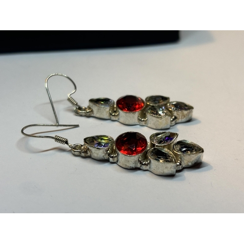 620 - A PAIR OF MARKED SILVER DROP EARRINGS WITH CLEAR AND RED STONES IN A PRESENTATION BOX