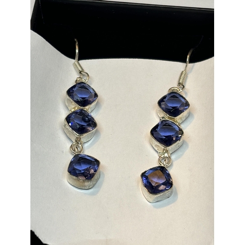 623 - A PAIR OF MARKED SILVER  DROP EARRINGS WITH THREE LONDON TOPAZ STONES IN A PRESENTATION BOX