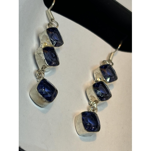 623 - A PAIR OF MARKED SILVER  DROP EARRINGS WITH THREE LONDON TOPAZ STONES IN A PRESENTATION BOX