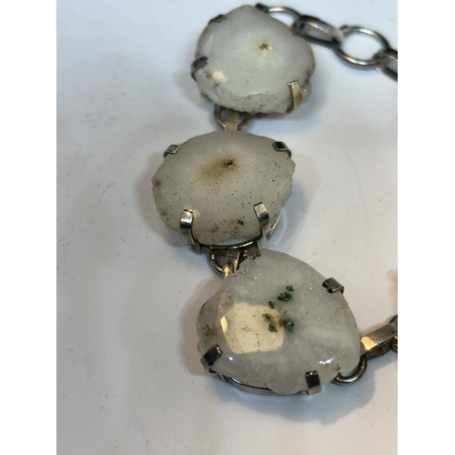 631 - A MARKED SILVER BRACELET WITH FIVE SOLAR QUARTZ STONES IN A PRESENTATION BOX