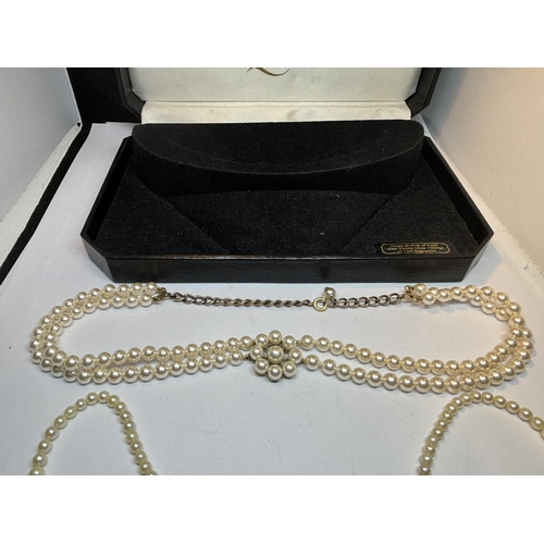 637 - TWO STRINGS OF PEARLS TO INCLUDE A DOUBLE STRAND AND A SINGLE STRAND IN A PRESENTATION BOX