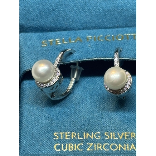 639 - A PAIR OF MARKED SILVER EARRINGS WITH PEARL AND CUBIC ZIRCONIA IN A PRESENTATION BOX