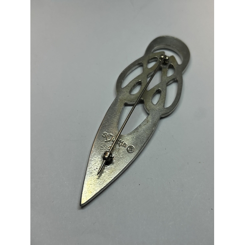 650 - A ST JUSTIN PEWTER KILT PIN IN A PRESENTATION BOX